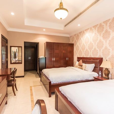Yanjoon Holiday Homes - Palm Jumeirah Frond A Villas Dubaï Extérieur photo