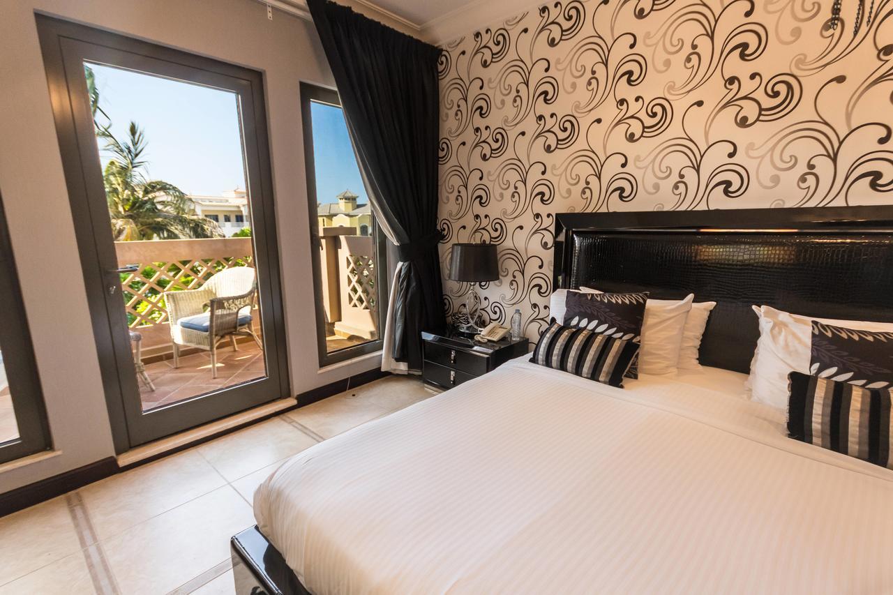 Yanjoon Holiday Homes - Palm Jumeirah Frond A Villas Dubaï Extérieur photo